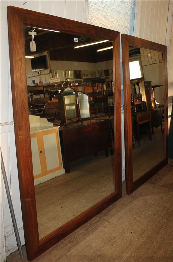 Pair of large modern rectangular walnut framed wall mirrors